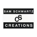 A rectangular sticker or label with a white background, featuring two vertical black side panels with the text 'SAM SCHWARTZ' and 'CREATIONS' in white, separated by a black stylized 'S' logo in the center.